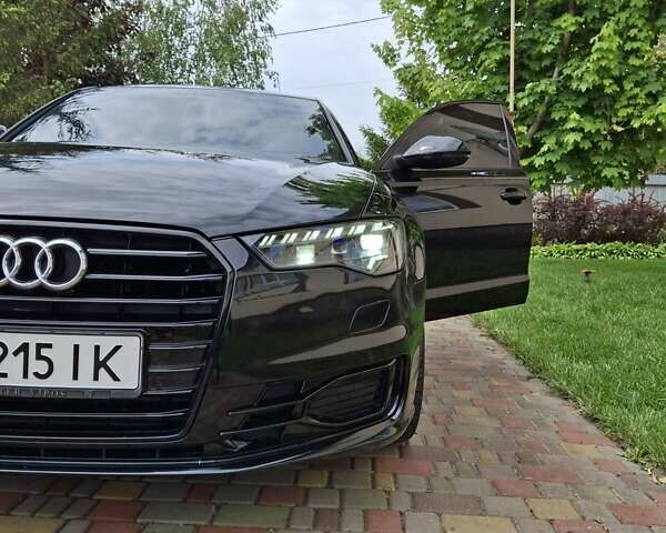Черный Ауди А6, объемом двигателя 1.98 л и пробегом 100 тыс. км за 23500 $, фото 10 на Automoto.ua