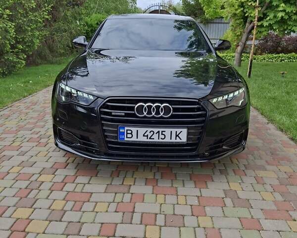 Черный Ауди А6, объемом двигателя 1.98 л и пробегом 100 тыс. км за 23500 $, фото 1 на Automoto.ua