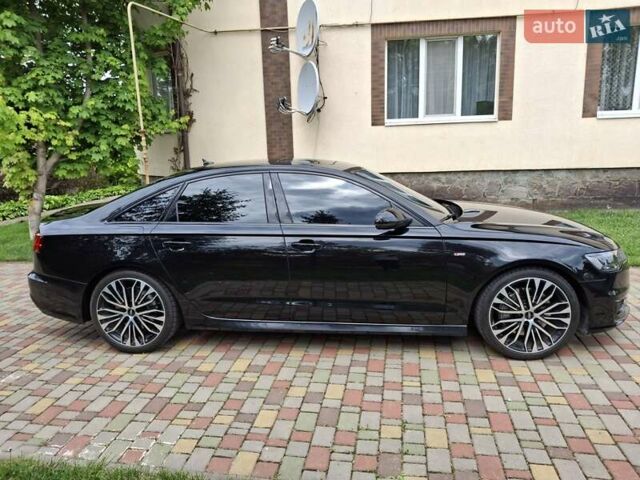 Черный Ауди А6, объемом двигателя 1.98 л и пробегом 100 тыс. км за 23500 $, фото 2 на Automoto.ua