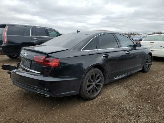 Черный Ауди А6, объемом двигателя 2 л и пробегом 100 тыс. км за 17200 $, фото 5 на Automoto.ua