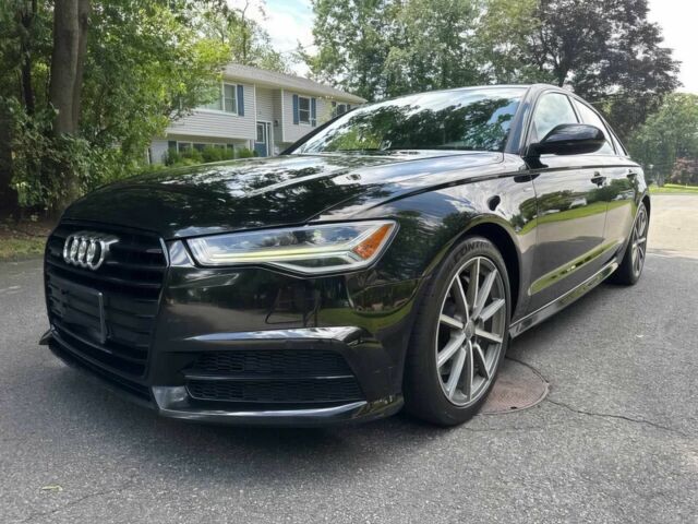 Черный Ауди А6, объемом двигателя 2 л и пробегом 30 тыс. км за 16450 $, фото 2 на Automoto.ua