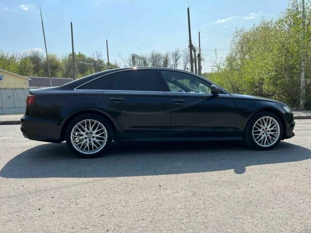 Чорний Ауді А6, об'ємом двигуна 2 л та пробігом 100 тис. км за 18500 $, фото 2 на Automoto.ua