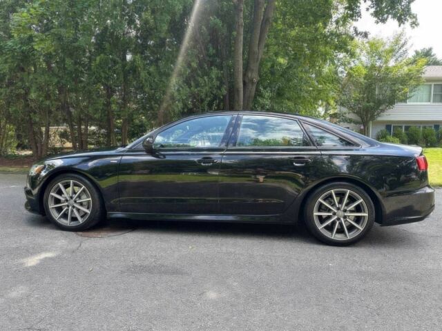 Черный Ауди А6, объемом двигателя 2 л и пробегом 30 тыс. км за 16450 $, фото 3 на Automoto.ua