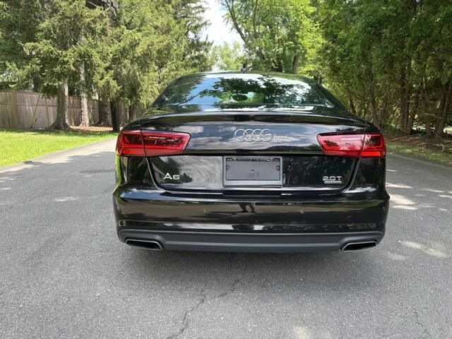 Черный Ауди А6, объемом двигателя 2 л и пробегом 30 тыс. км за 16450 $, фото 5 на Automoto.ua