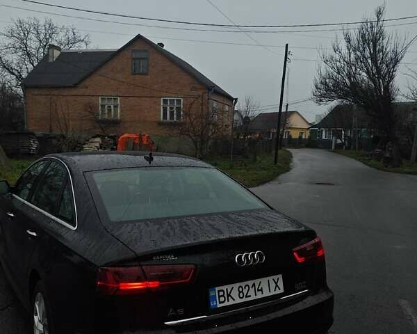 Черный Ауди А6, объемом двигателя 1.98 л и пробегом 102 тыс. км за 20950 $, фото 2 на Automoto.ua