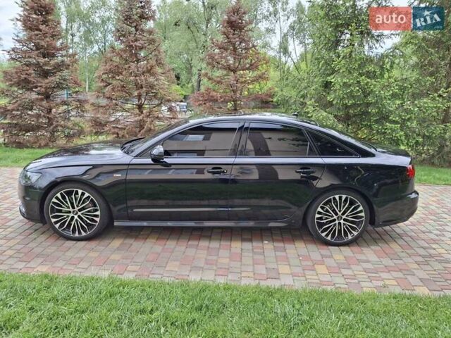 Черный Ауди А6, объемом двигателя 1.98 л и пробегом 100 тыс. км за 23500 $, фото 6 на Automoto.ua