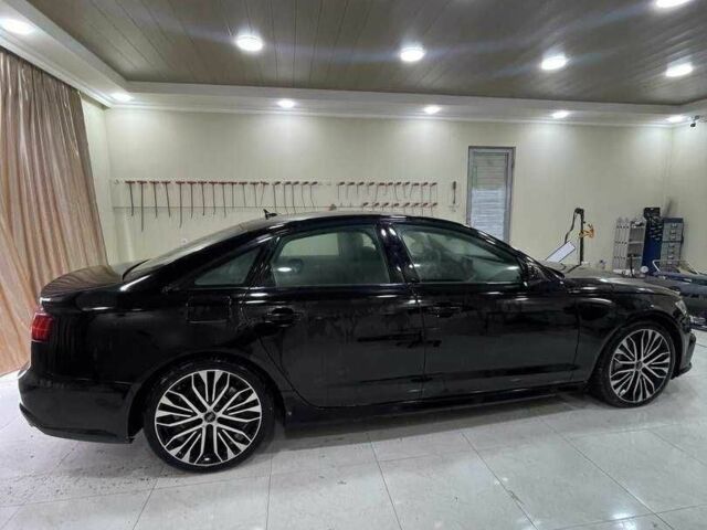 Черный Ауди А6, объемом двигателя 0 л и пробегом 115 тыс. км за 18200 $, фото 2 на Automoto.ua