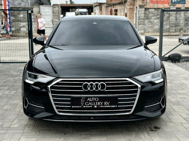 Черный Ауди А6, объемом двигателя 2 л и пробегом 140 тыс. км за 32588 $, фото 2 на Automoto.ua