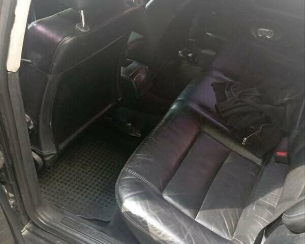 Черный Ауди А6, объемом двигателя 2.6 л и пробегом 400 тыс. км за 3008 $, фото 5 на Automoto.ua