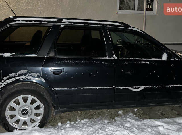 Черный Ауди А6, объемом двигателя 2.6 л и пробегом 300 тыс. км за 3500 $, фото 1 на Automoto.ua