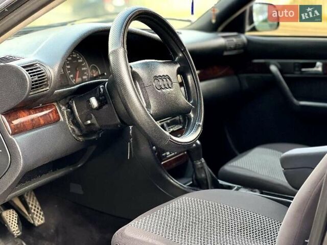 Черный Ауди А6, объемом двигателя 2.8 л и пробегом 331 тыс. км за 2800 $, фото 1 на Automoto.ua