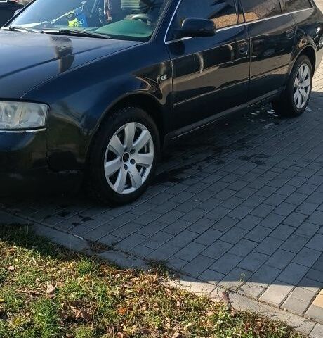 Чорний Ауді А6, об'ємом двигуна 2 л та пробігом 250 тис. км за 2300 $, фото 1 на Automoto.ua