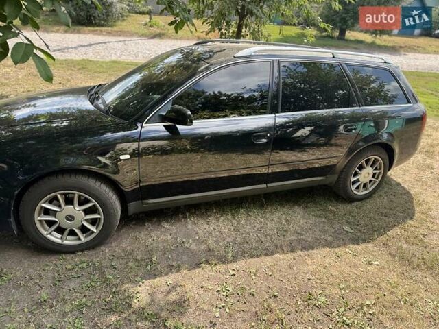 Черный Ауди А6, объемом двигателя 2.39 л и пробегом 312 тыс. км за 5700 $, фото 4 на Automoto.ua