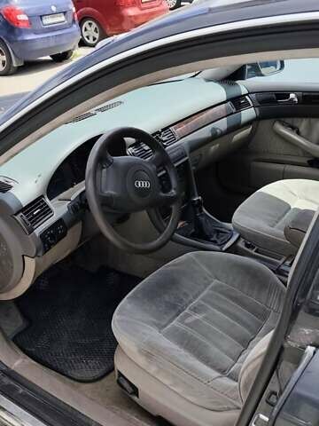 Черный Ауди А6, объемом двигателя 2.5 л и пробегом 320 тыс. км за 2150 $, фото 5 на Automoto.ua