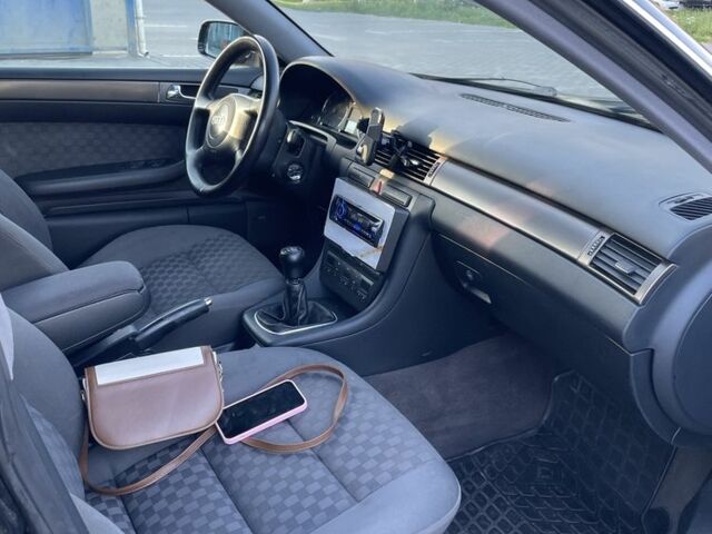 Черный Ауди А6, объемом двигателя 1.8 л и пробегом 350 тыс. км за 3600 $, фото 5 на Automoto.ua