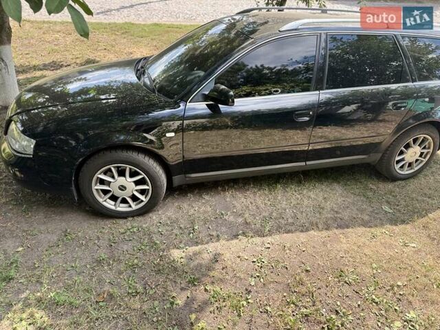 Черный Ауди А6, объемом двигателя 2.39 л и пробегом 312 тыс. км за 5700 $, фото 1 на Automoto.ua