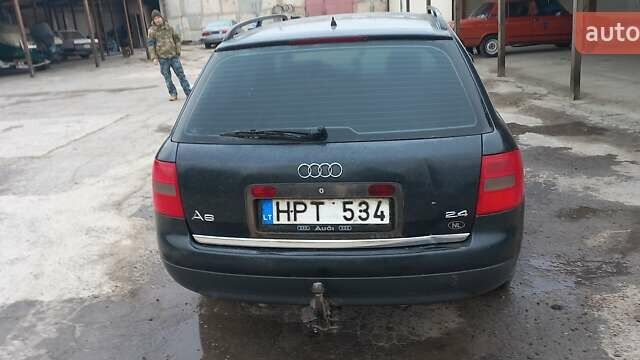 Черный Ауди А6, объемом двигателя 2.4 л и пробегом 340 тыс. км за 3618 $, фото 4 на Automoto.ua