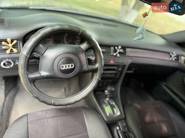 Черный Ауди А6, объемом двигателя 2.39 л и пробегом 312 тыс. км за 5700 $, фото 11 на Automoto.ua