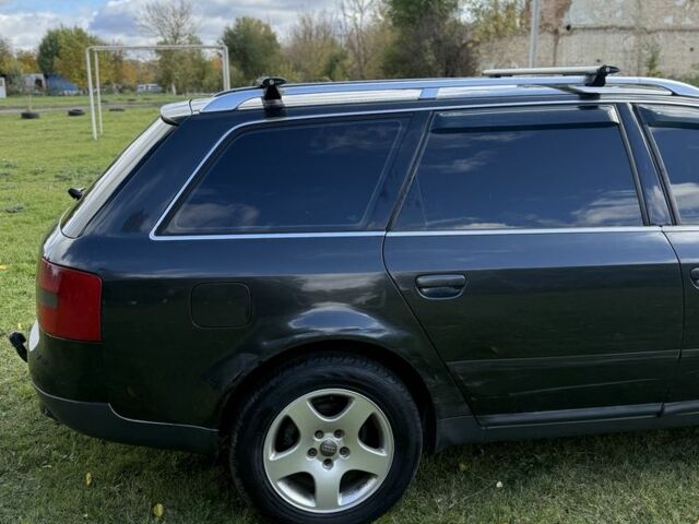 Черный Ауди А6, объемом двигателя 2.5 л и пробегом 350 тыс. км за 3699 $, фото 7 на Automoto.ua