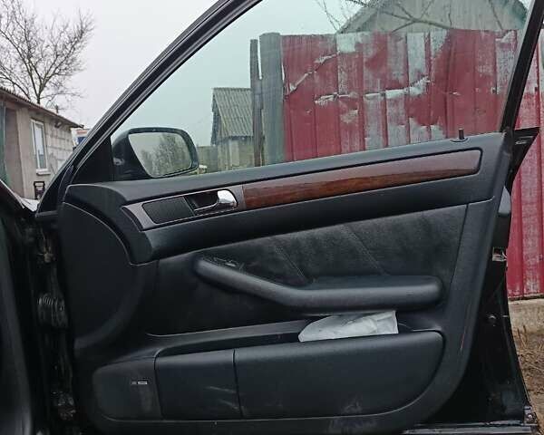 Черный Ауди А6, объемом двигателя 2.5 л и пробегом 370 тыс. км за 4000 $, фото 9 на Automoto.ua