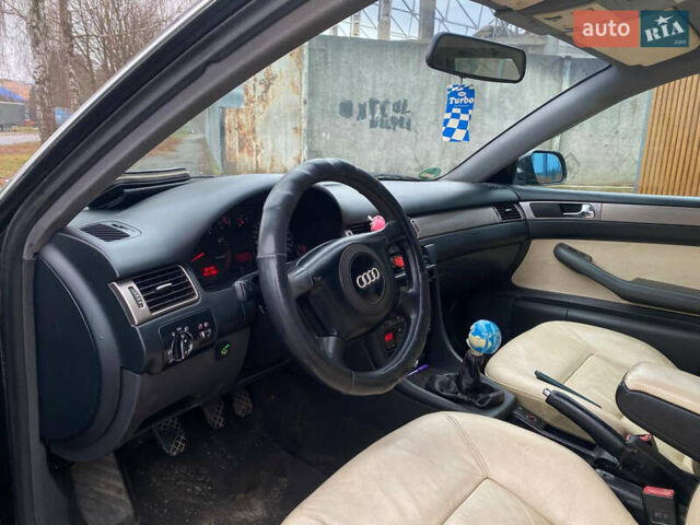 Черный Ауди А6, объемом двигателя 1.78 л и пробегом 450 тыс. км за 3500 $, фото 7 на Automoto.ua