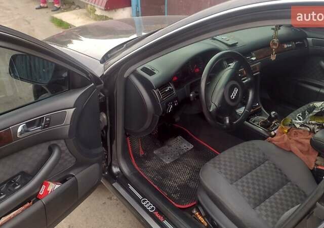 Черный Ауди А6, объемом двигателя 2.5 л и пробегом 310 тыс. км за 4800 $, фото 11 на Automoto.ua