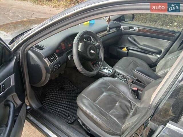 Черный Ауди А6, объемом двигателя 2.5 л и пробегом 406 тыс. км за 4900 $, фото 2 на Automoto.ua