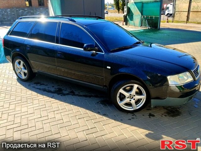 Черный Ауди А6, объемом двигателя 2.5 л и пробегом 258 тыс. км за 4500 $, фото 1 на Automoto.ua