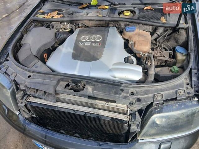 Черный Ауди А6, объемом двигателя 2.5 л и пробегом 406 тыс. км за 4900 $, фото 3 на Automoto.ua