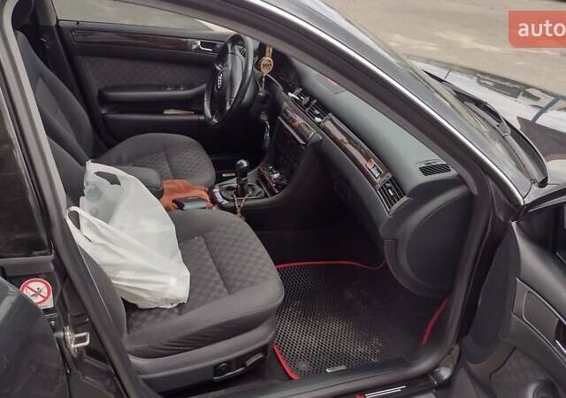 Черный Ауди А6, объемом двигателя 2.5 л и пробегом 310 тыс. км за 4800 $, фото 4 на Automoto.ua