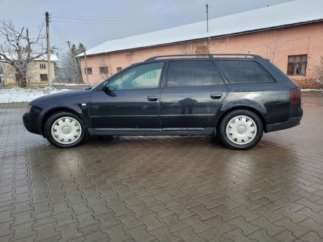 Черный Ауди А6, объемом двигателя 2.5 л и пробегом 251 тыс. км за 3499 $, фото 1 на Automoto.ua