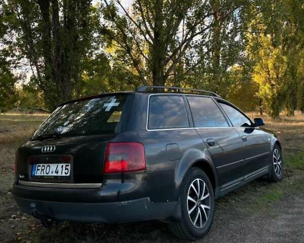 Черный Ауди А6, объемом двигателя 2 л и пробегом 167 тыс. км за 4500 $, фото 1 на Automoto.ua