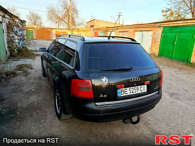 Чорний Ауді А6, об'ємом двигуна 1.8 л та пробігом 240 тис. км за 3750 $, фото 4 на Automoto.ua
