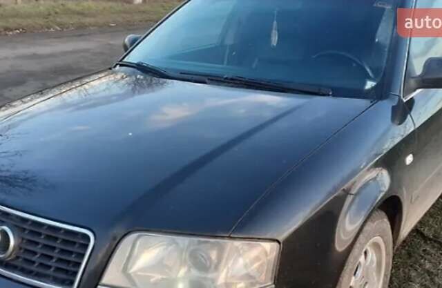 Черный Ауди А6, объемом двигателя 2.5 л и пробегом 382 тыс. км за 5250 $, фото 5 на Automoto.ua