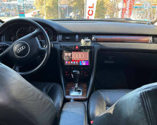 Черный Ауди А6, объемом двигателя 2.5 л и пробегом 268 тыс. км за 4000 $, фото 5 на Automoto.ua