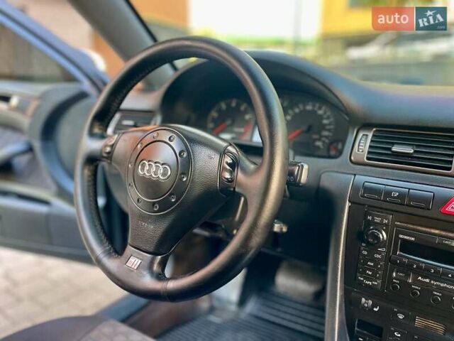 Черный Ауди А6, объемом двигателя 1.8 л и пробегом 326 тыс. км за 5800 $, фото 4 на Automoto.ua