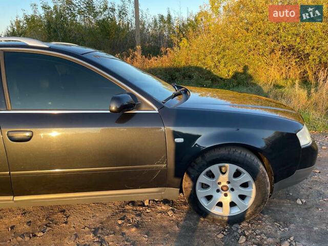 Черный Ауди А6, объемом двигателя 2.5 л и пробегом 384 тыс. км за 4800 $, фото 1 на Automoto.ua