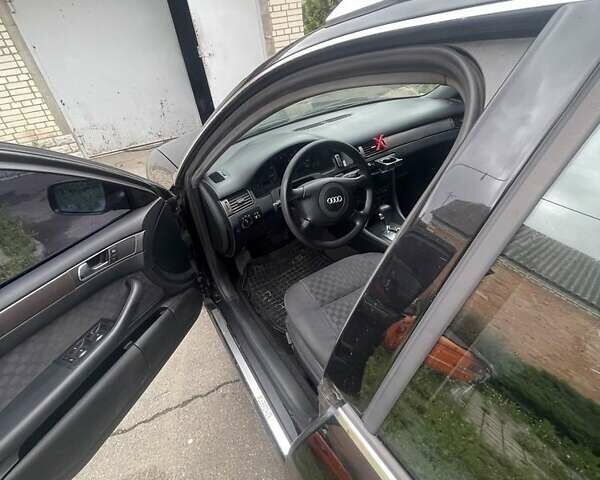 Чорний Ауді А6, об'ємом двигуна 1.8 л та пробігом 300 тис. км за 4000 $, фото 4 на Automoto.ua