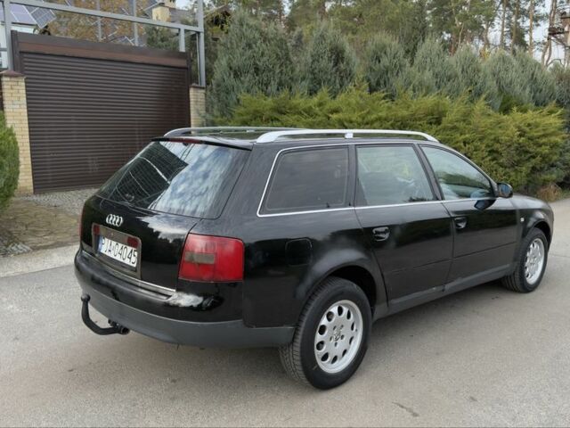 Черный Ауди А6, объемом двигателя 1.8 л и пробегом 300 тыс. км за 1750 $, фото 4 на Automoto.ua