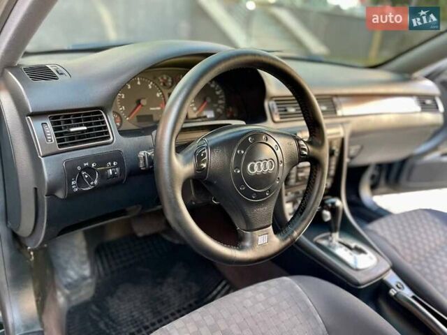 Черный Ауди А6, объемом двигателя 1.8 л и пробегом 326 тыс. км за 5800 $, фото 6 на Automoto.ua