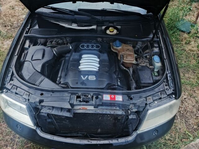 Черный Ауди А6, объемом двигателя 2.4 л и пробегом 333 тыс. км за 5500 $, фото 3 на Automoto.ua