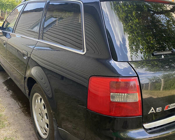 Черный Ауди А6, объемом двигателя 2.5 л и пробегом 401 тыс. км за 3999 $, фото 4 на Automoto.ua