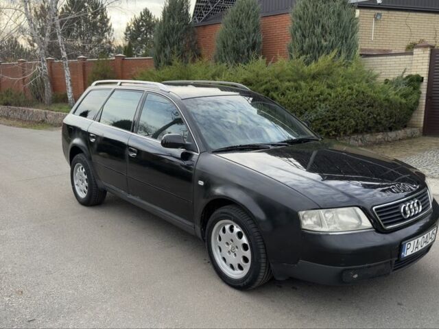 Черный Ауди А6, объемом двигателя 1.8 л и пробегом 300 тыс. км за 1750 $, фото 2 на Automoto.ua