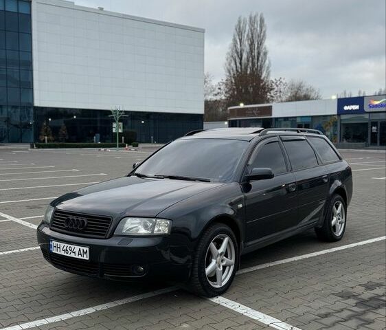 Черный Ауди А6, объемом двигателя 2.5 л и пробегом 323 тыс. км за 4500 $, фото 1 на Automoto.ua