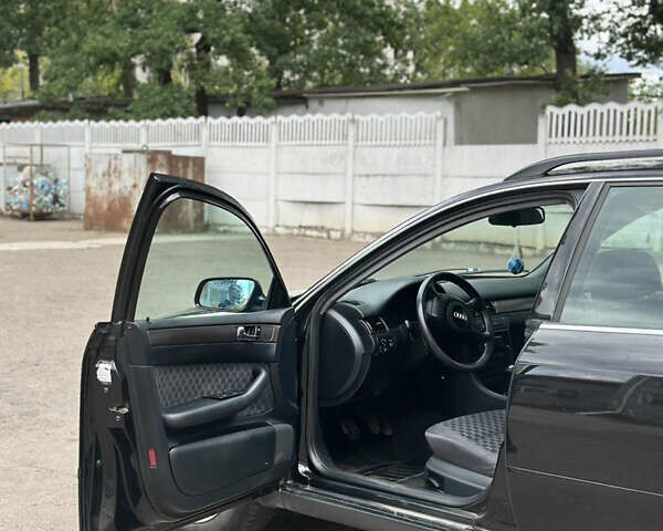 Черный Ауди А6, объемом двигателя 2.5 л и пробегом 418 тыс. км за 3900 $, фото 3 на Automoto.ua