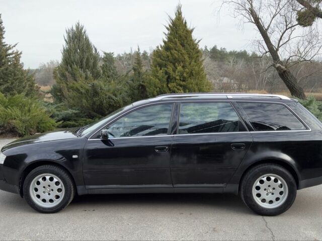 Черный Ауди А6, объемом двигателя 1.8 л и пробегом 300 тыс. км за 1750 $, фото 7 на Automoto.ua