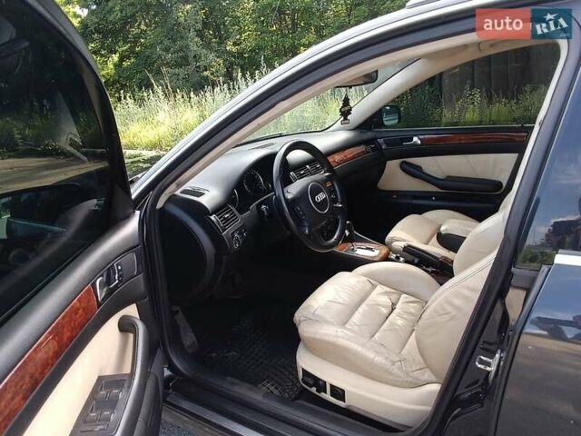 Ауді А6 2001 у Харкові на Automoto.ua Чорний Ауді А6, об'ємом двигуна 0 л та пробігом 310 тис. км за 3200 $, фото 2 на Automoto.ua