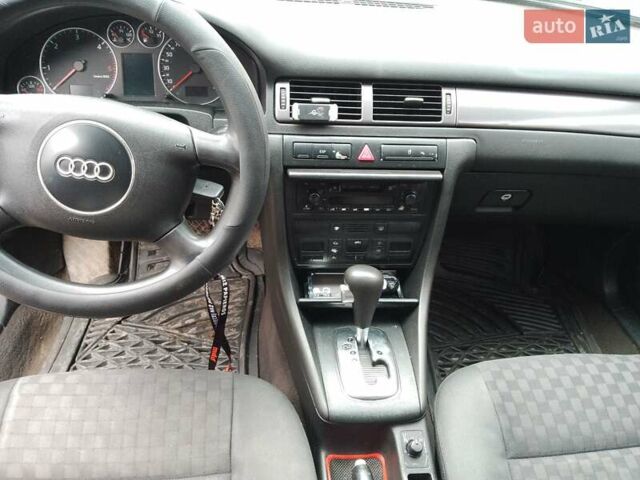 Черный Ауди А6, объемом двигателя 2.5 л и пробегом 408 тыс. км за 4300 $, фото 1 на Automoto.ua