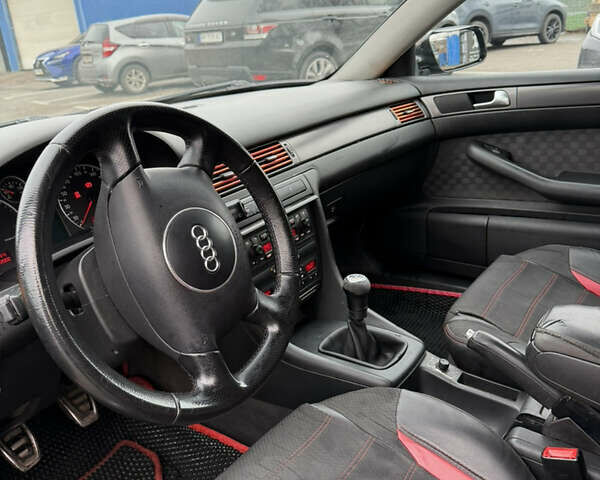 Черный Ауди А6, объемом двигателя 2.5 л и пробегом 95 тыс. км за 3850 $, фото 5 на Automoto.ua