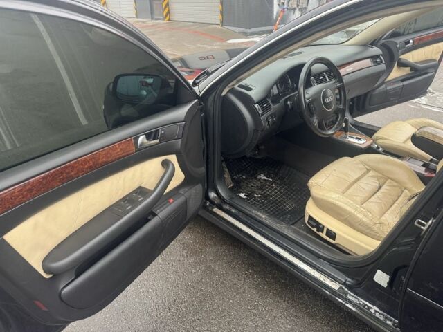 Черный Ауди А6, объемом двигателя 2.5 л и пробегом 300 тыс. км за 2350 $, фото 9 на Automoto.ua